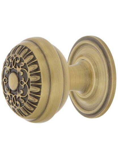 Egg and Dart Cabinet Knob - 1 3/8 inch Diameter with Classic Rosette in Antique Brass.